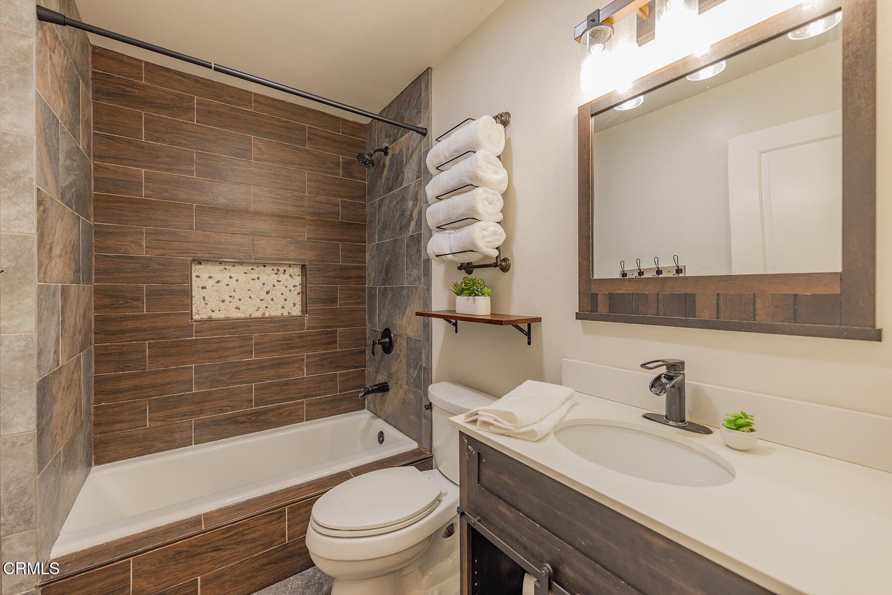 165 Burnham Road Oak View, CA 93022 - Photo 32 of 58 a bathroom with a sink toilet and shower