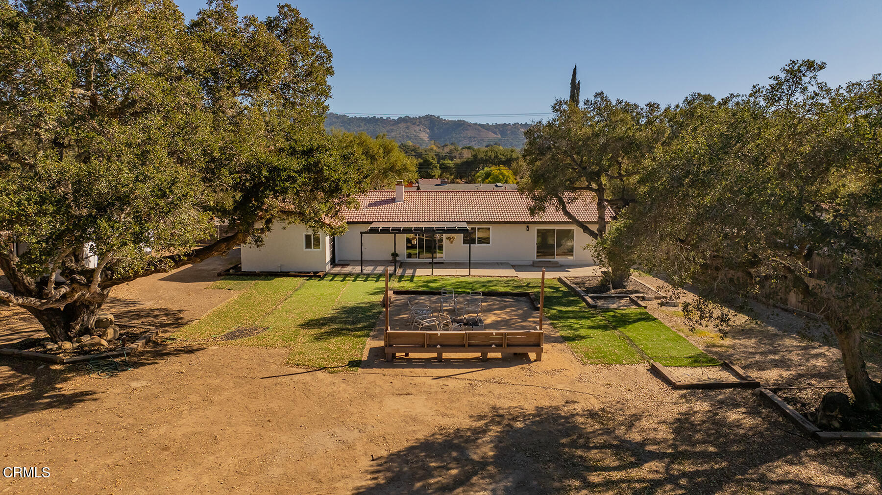 165 Burnham Road Oak View, CA 93022 - Photo 42 of 58 a front view of a house with a yard