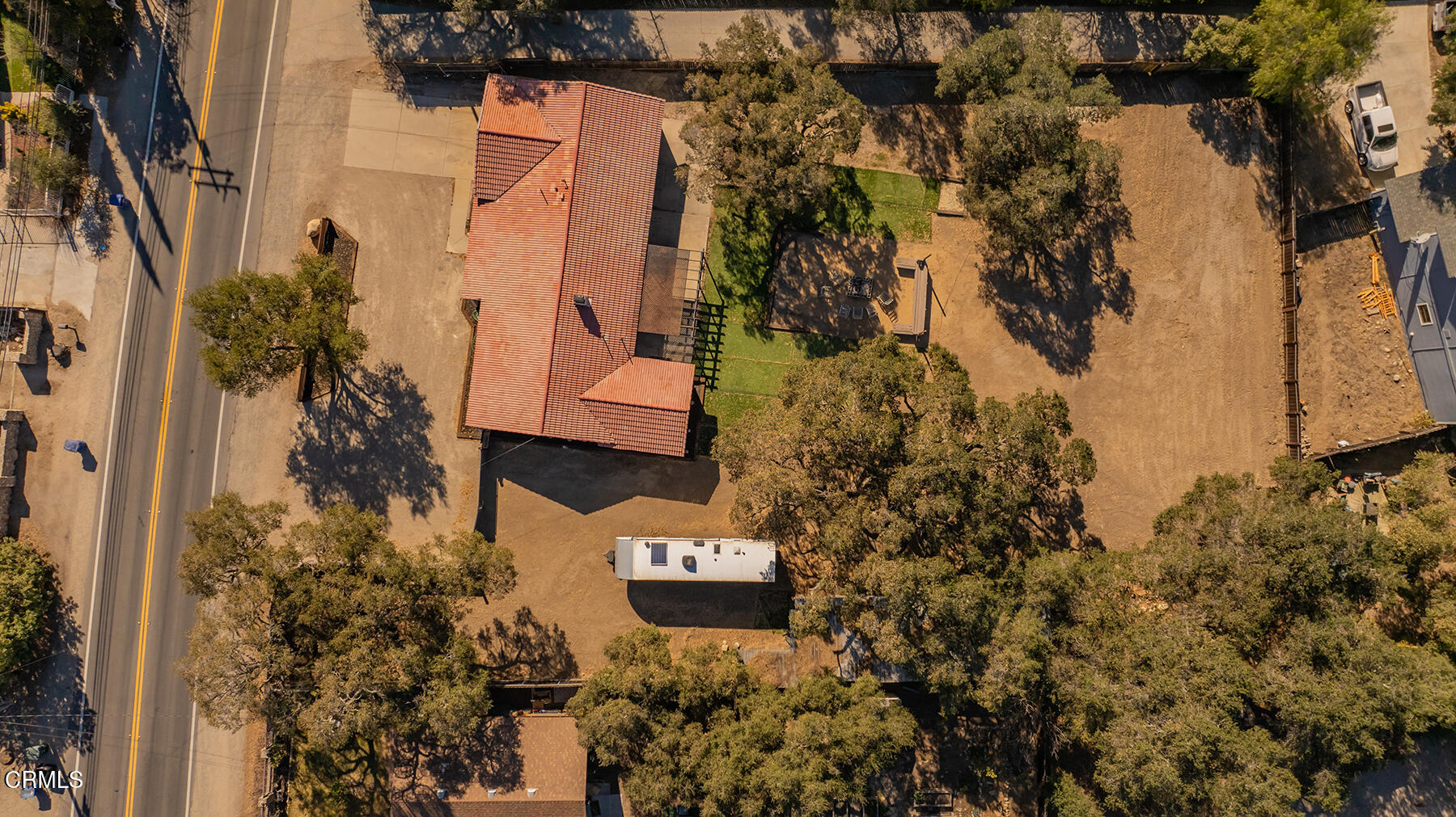 165 Burnham Road Oak View, CA 93022 - Photo 47 of 58 a aerial view of a house with a yard and large trees
