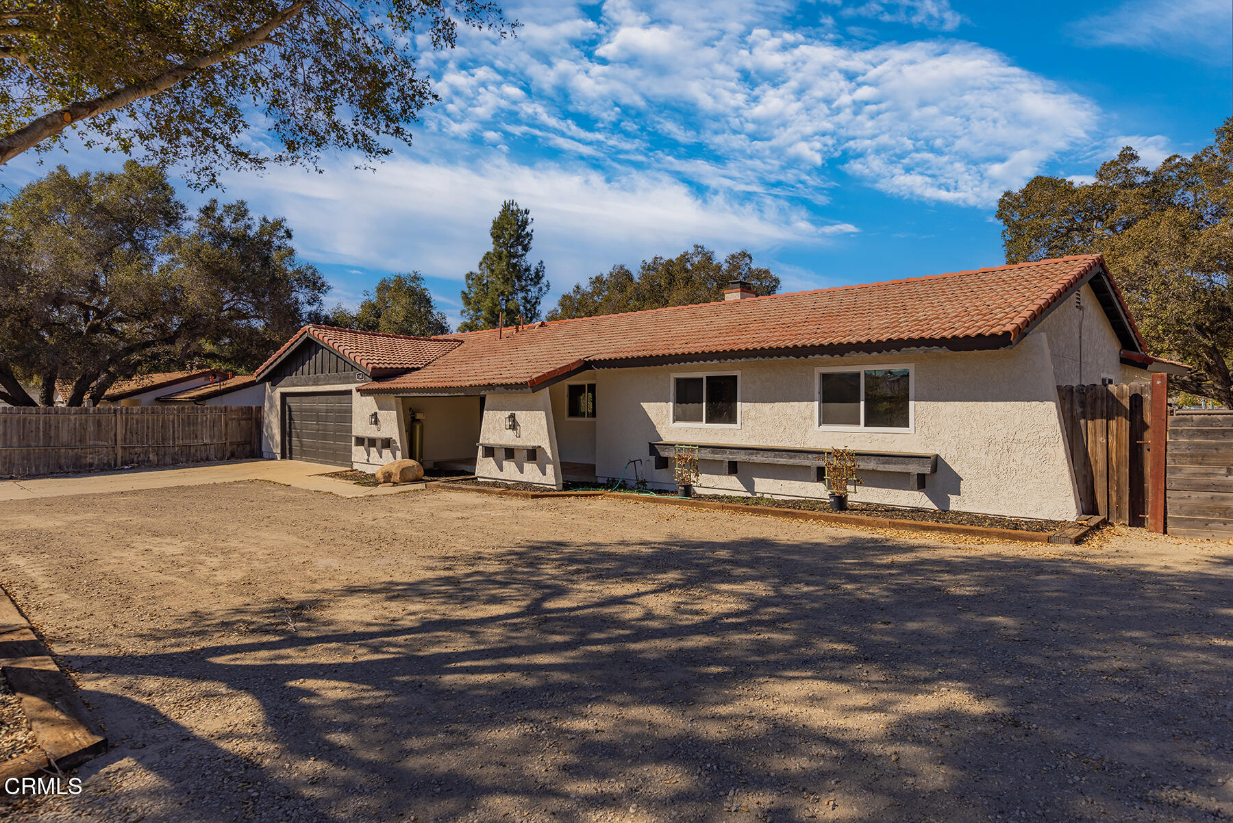 165 Burnham Road Oak View, CA 93022 - Photo 57 of 58 a house with trees in the background