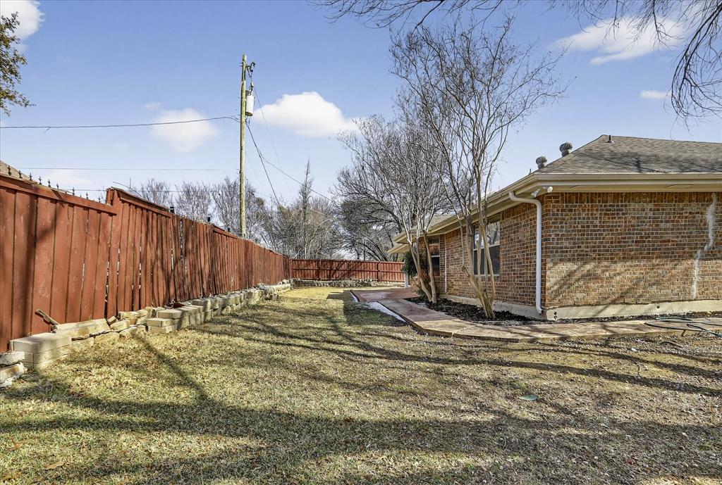 2010 Libby Lane Grand Prairie, TX 75050 - Photo 24 of 24 a view of a backyard