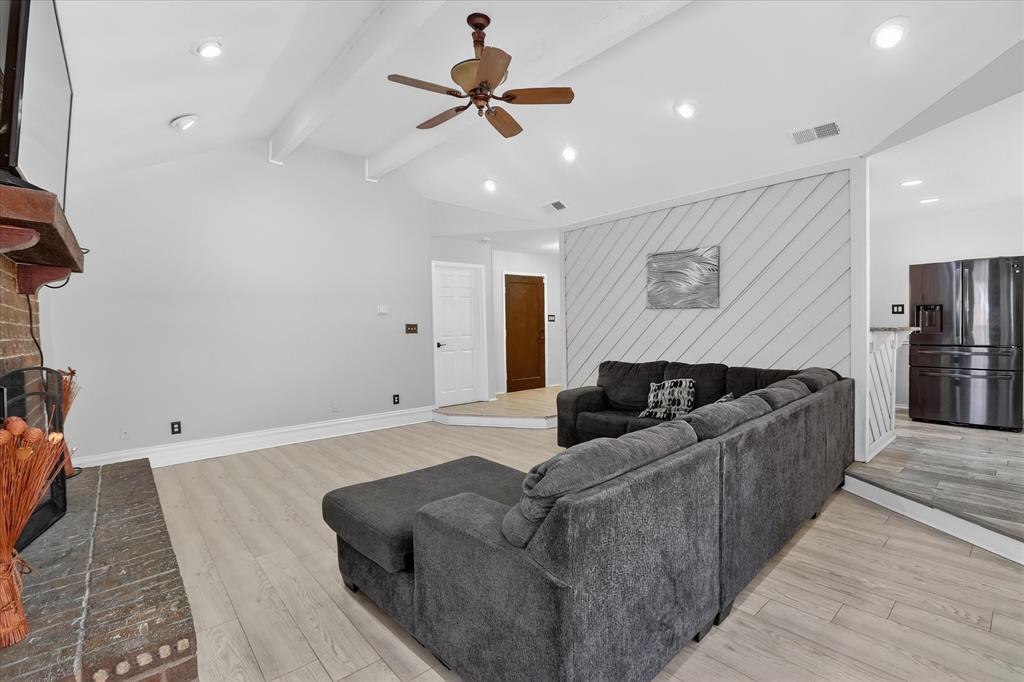 2010 Libby Lane Grand Prairie, TX 75050 - Photo 6 of 24 a living room with furniture and a ceiling fan