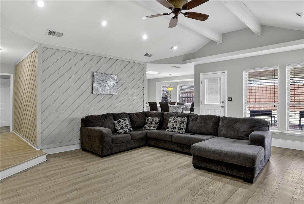 2010 Libby Lane Grand Prairie, TX 75050 - Photo 7 of 24 a living room with furniture and a ceiling fan