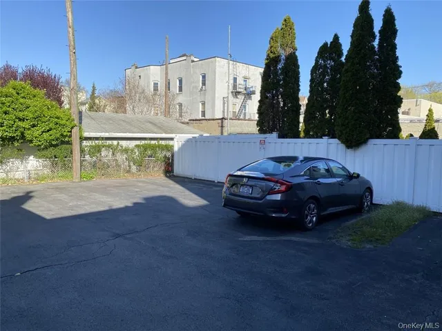 a view of a brick buildings with many windows