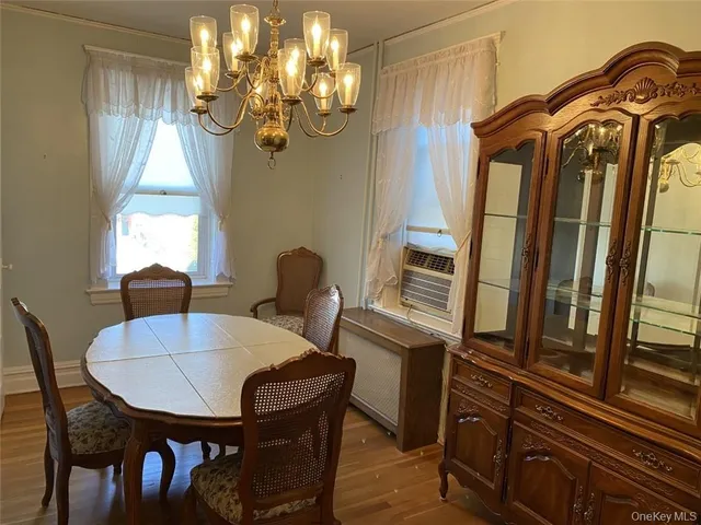 a bathroom with a sink a toilet and shower curtain
