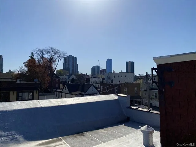a view of swimming pool with outdoor seating