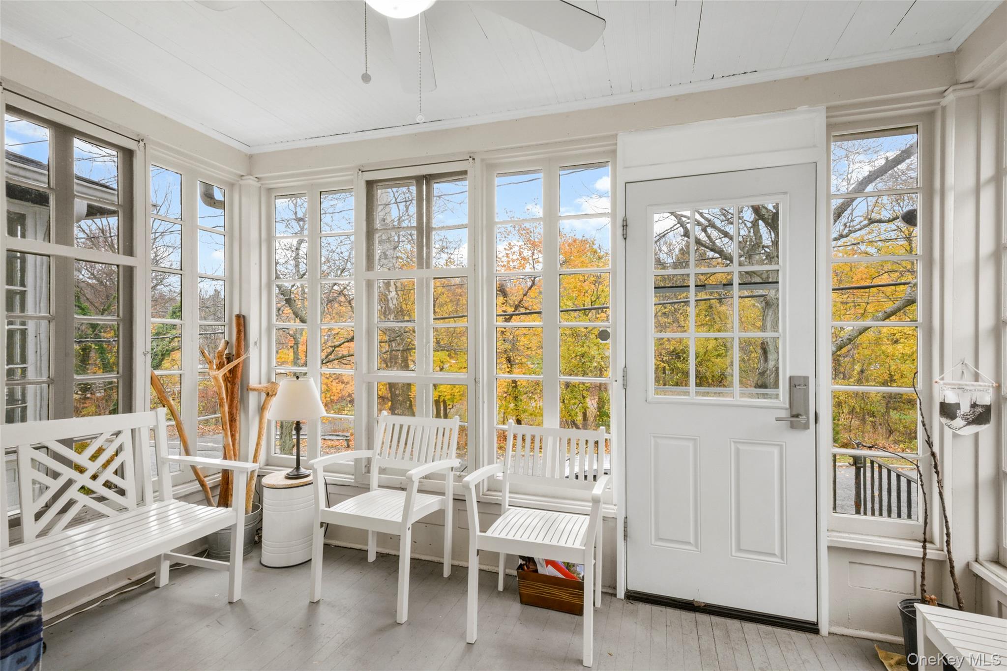 330 First Avenue, Unit LEFT SIDE Pelham, NY 10803 - Photo 2 of 19 a living room with furniture and a window