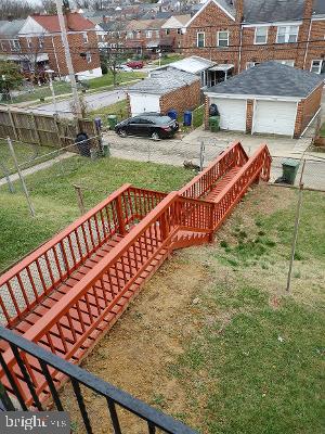 1547 East Cold Spring Lane Baltimore, MD 21218 - Photo 2 of 16 backyard stair deckway