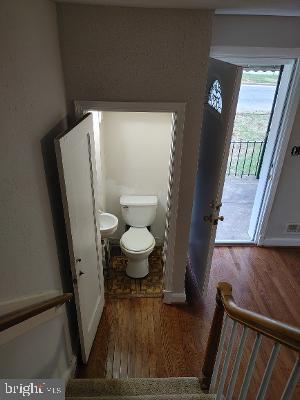 1547 East Cold Spring Lane Baltimore, MD 21218 - Photo 12 of 16 1st floor half bathroom