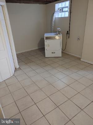 1547 East Cold Spring Lane Baltimore, MD 21218 - Photo 14 of 16 rear basement and dryer