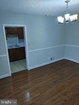 1547 East Cold Spring Lane Baltimore, MD 21218 - Photo 5 of 16 diningroom lead to kitchen