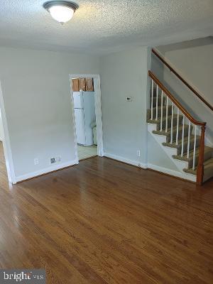 1547 East Cold Spring Lane Baltimore, MD 21218 - Photo 8 of 16 livingroom kitchen entryway