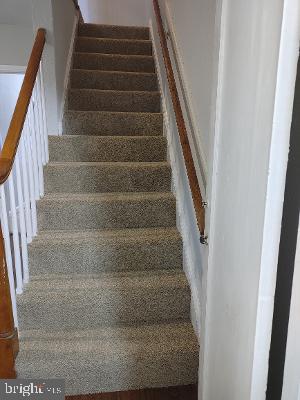 1547 East Cold Spring Lane Baltimore, MD 21218 - Photo 9 of 16 stairs to bedrooms