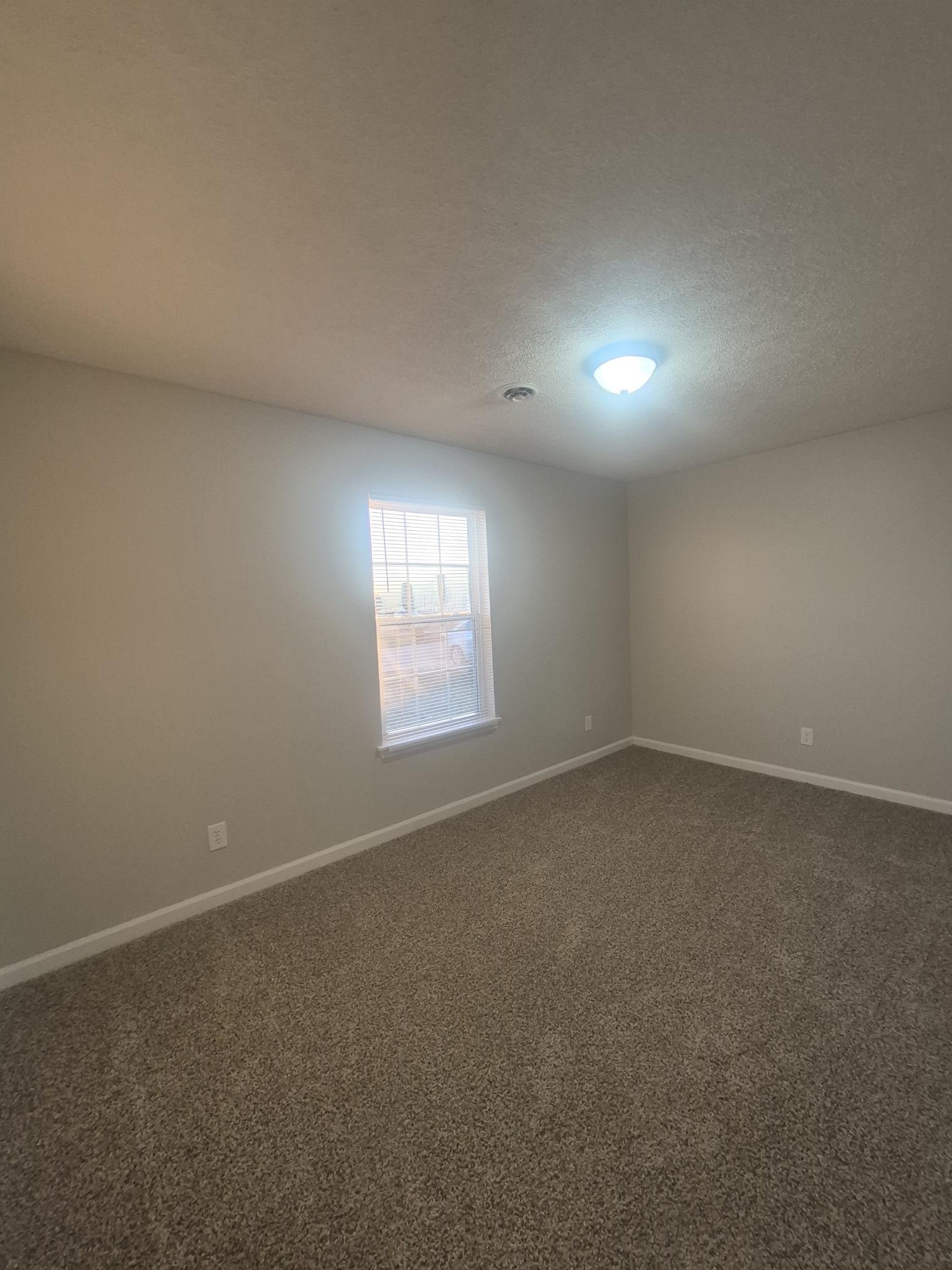 403 Eddy Street Oak Grove, KY 42262 - Photo 11 of 13 an empty room with a window