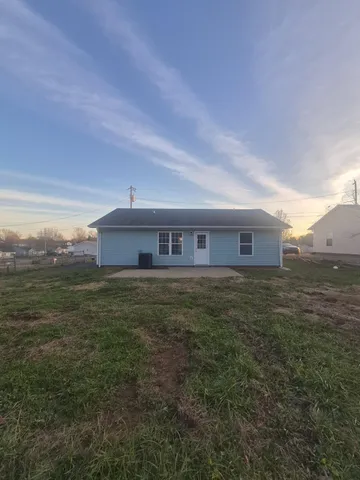 a view of a house with a big yard