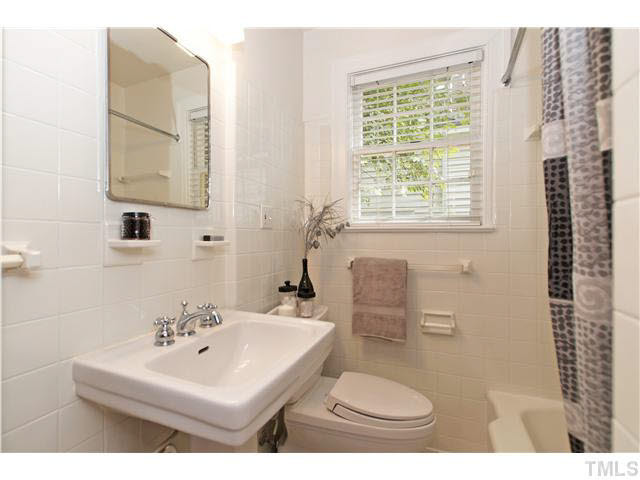 517 Gardner Street Raleigh, NC 27607 - Photo 13 of 21 Secondary bathroom is completely tiled and includes new everything from top to bottom!
