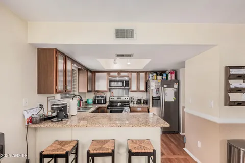 a view of a dining room with furniture