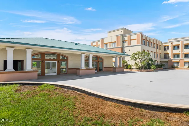front view of a house with a patio