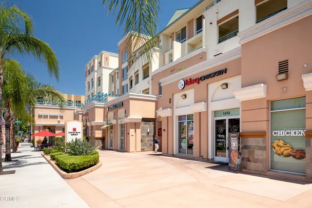a view of a building with a street