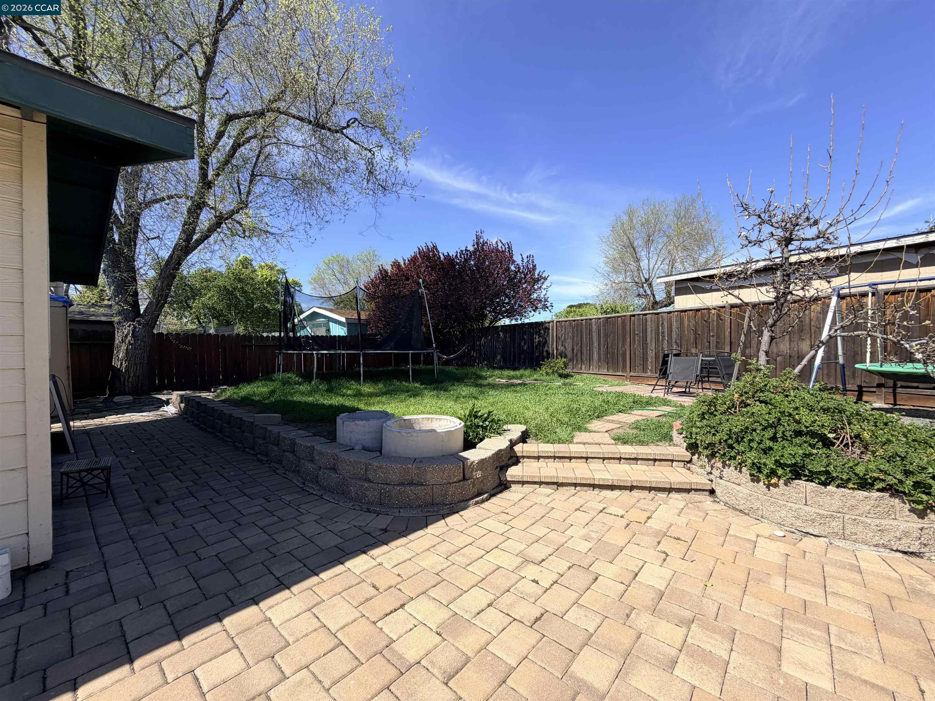 3355 Bennett Way Concord, CA 94519 - Photo 2 of 3 a view of a backyard with plants and brick walls