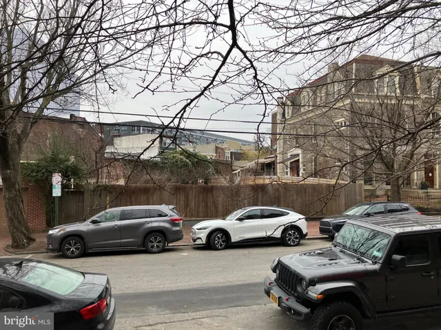 a view of cars parked in a parking lot