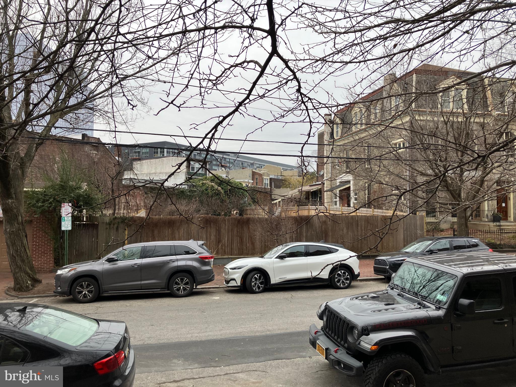 204 North 36th Street Philadelphia, PA 19104 - Photo 5 of 9 Urban street scene with parked vehicles.
