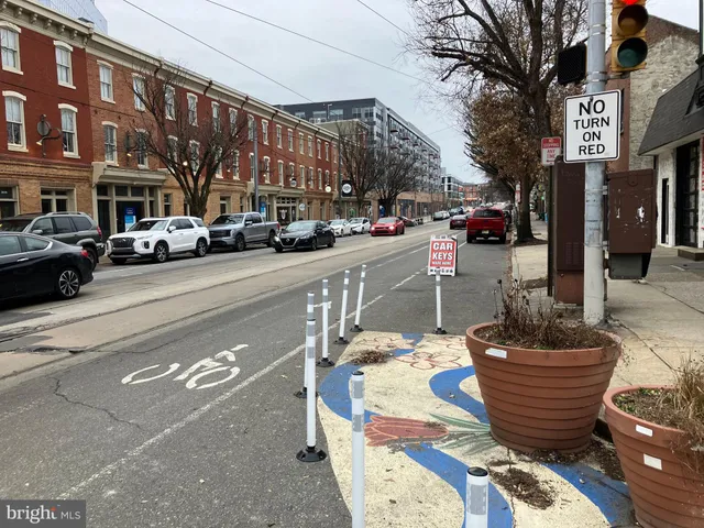 a view of a street with cars