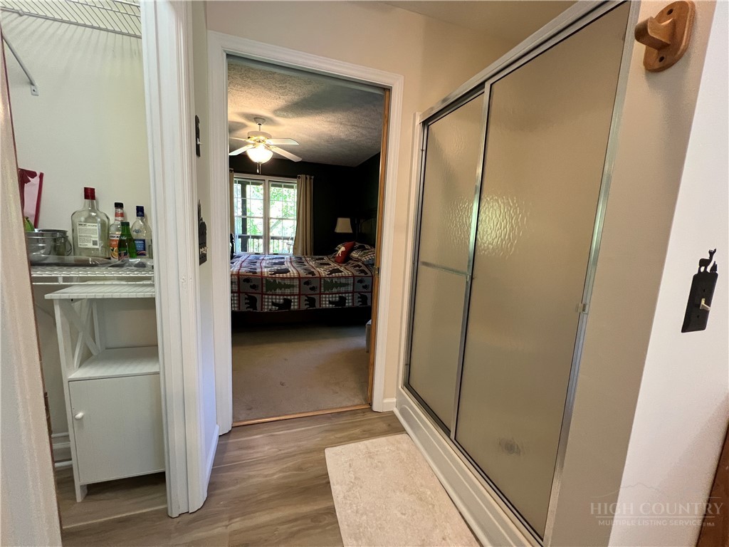 139 New River Ridge Estates Laurel Springs, NC 28644 - Photo 16 of 34 a en suite bathroom with a sink and mirror