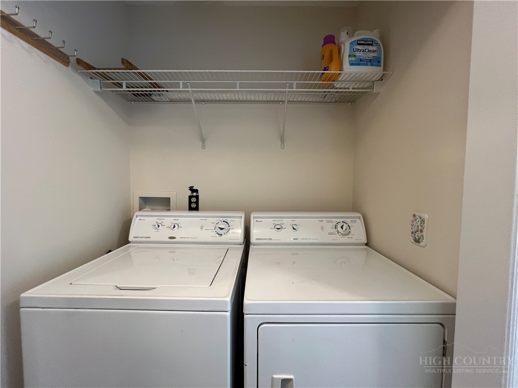 139 New River Ridge Estates Laurel Springs, NC 28644 - Photo 17 of 34 a utility room with dryer and washer