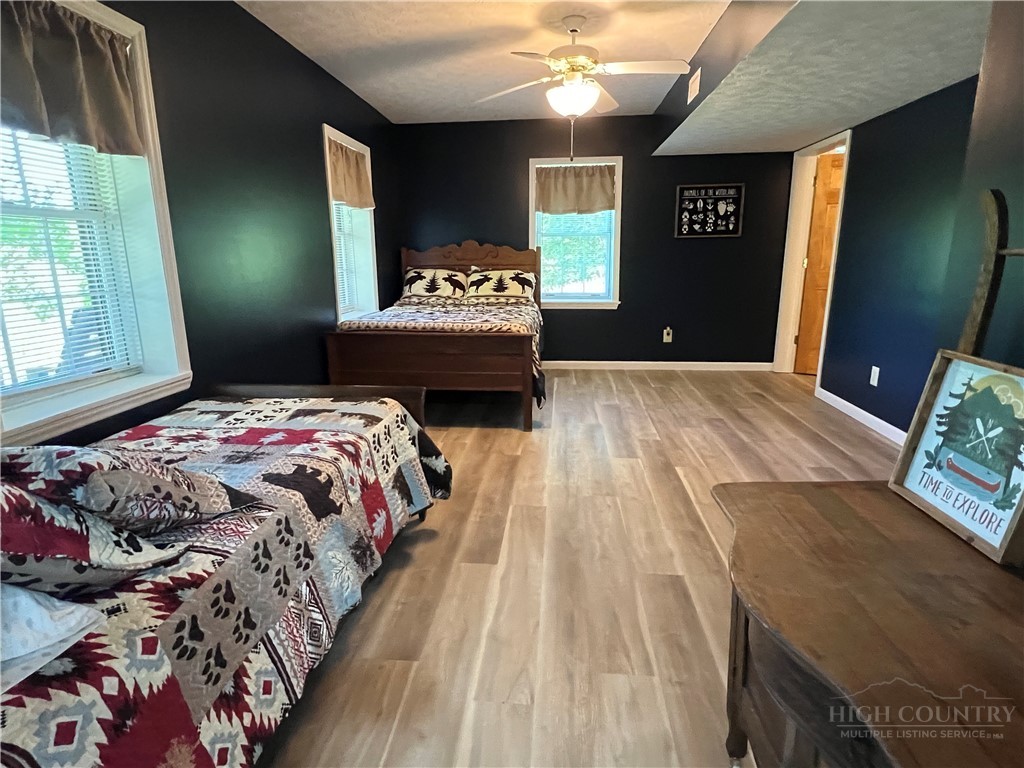 139 New River Ridge Estates Laurel Springs, NC 28644 - Photo 24 of 34 a bedroom with a bed and window