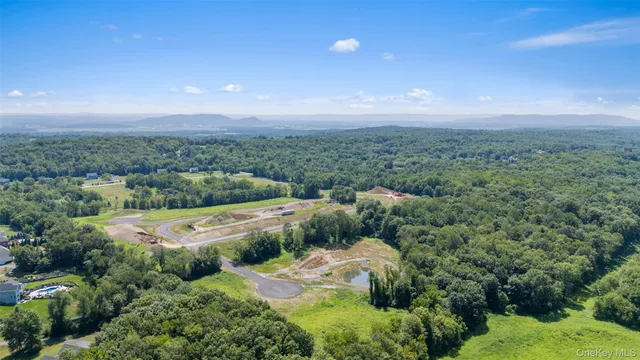 an aerial view of residential house with outdoor space