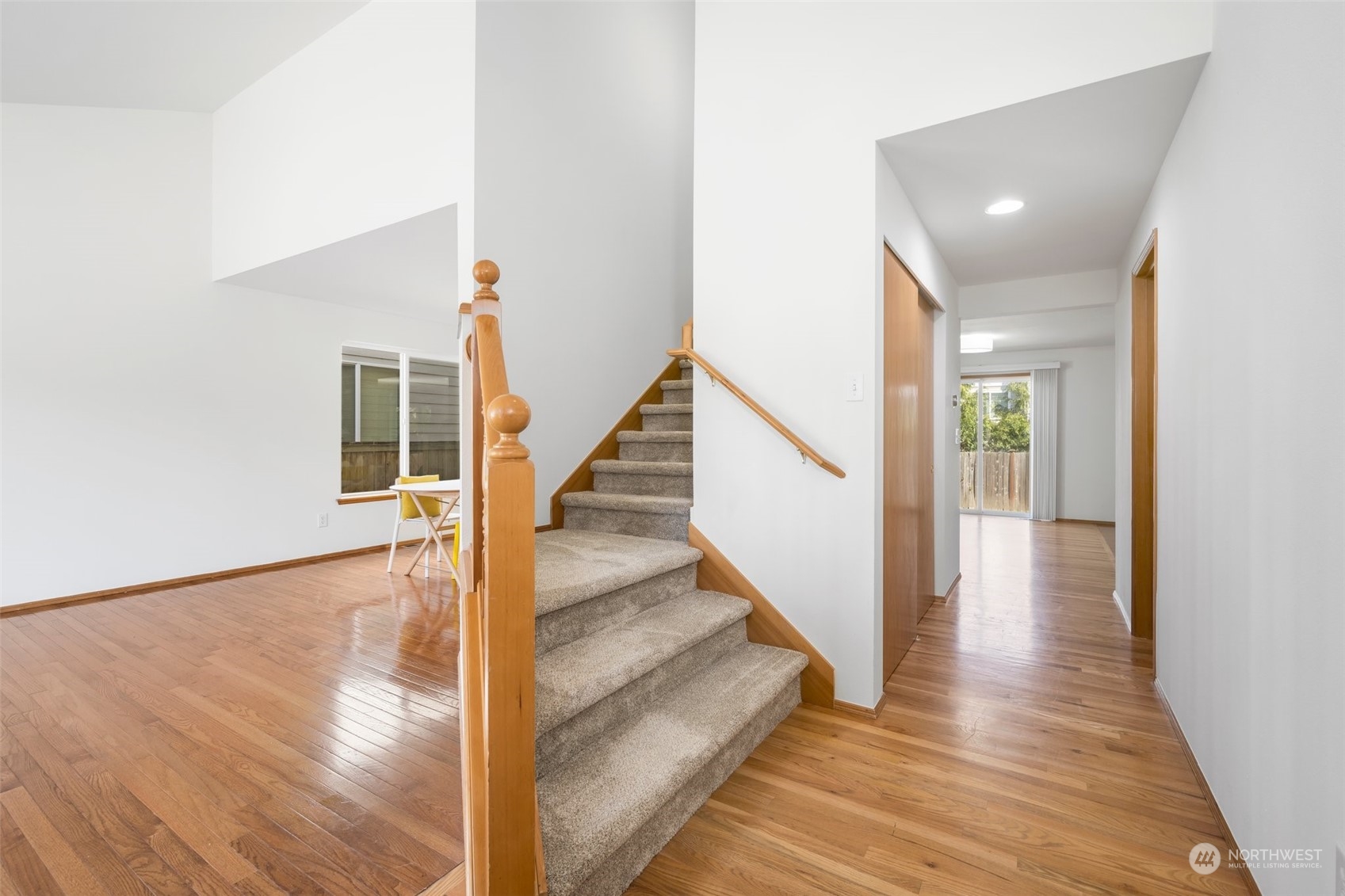 4318 Northeast 2nd Court Renton, WA 98059 - Photo 11 of 29 a view of a hallway view with wooden floor and staircase