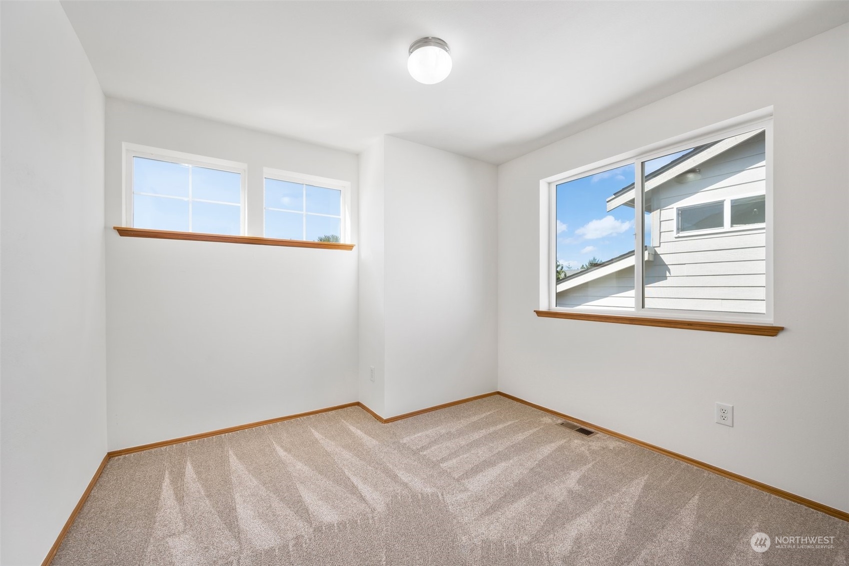 4318 Northeast 2nd Court Renton, WA 98059 - Photo 13 of 29 a view of an empty room with a window