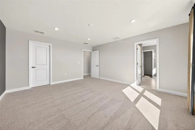 a view of a room with a wardrobe space