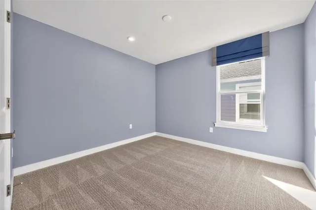 a view of a swimming pool with a lake view