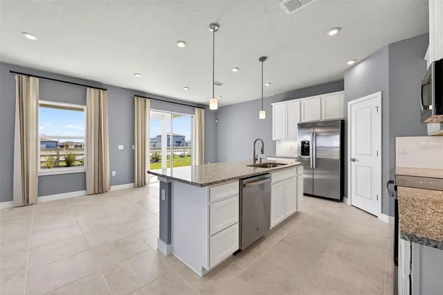 a view of an empty room with a sliding door
