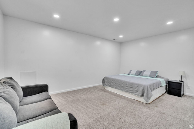 3269 West 650 North Layton, UT 84041 - Photo 24 of 35 Spacious room featuring neutral paint, recessed lighting, and light gray carpet flooring