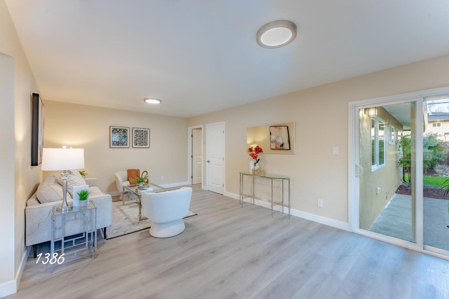1384 Darryl Drive San Jose, CA 95130 - Photo 11 of 34 a living room with furniture and a wooden floor