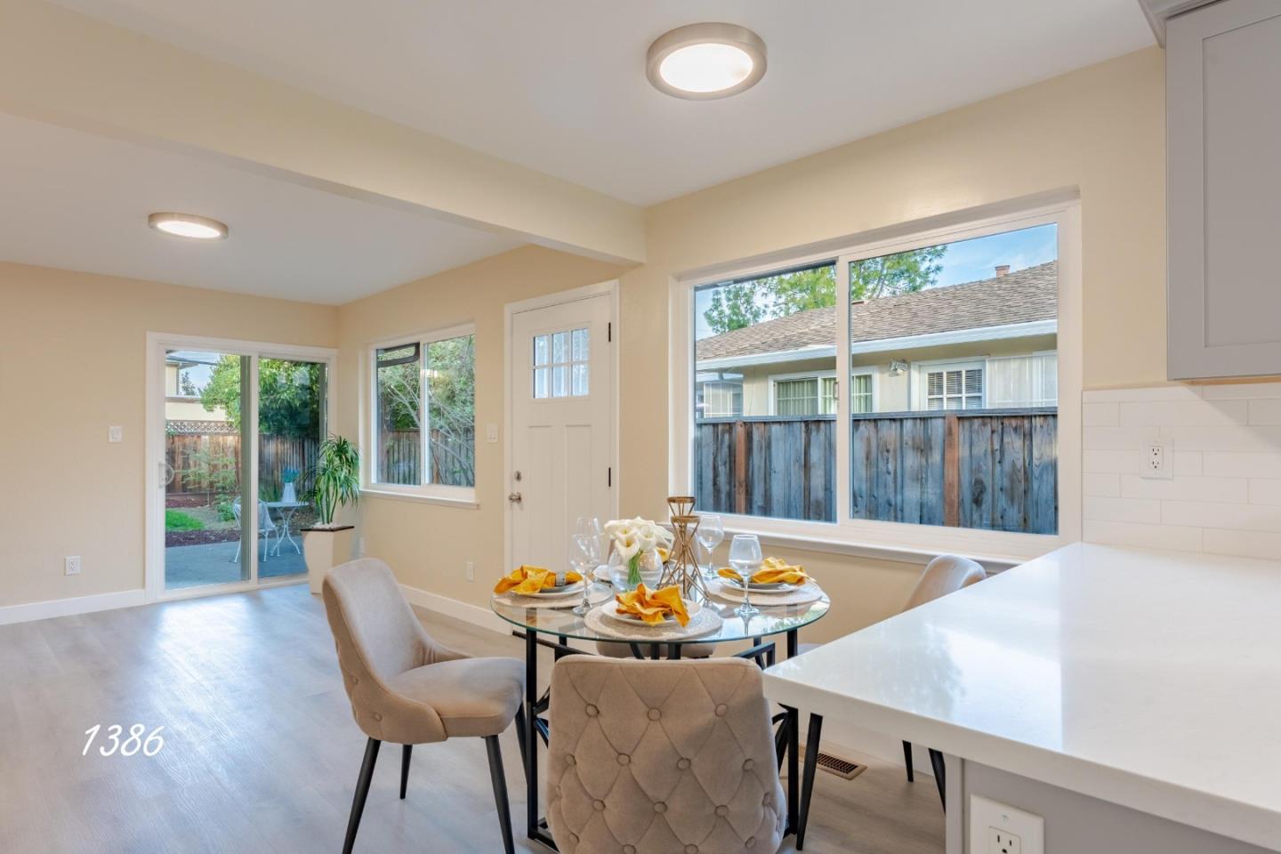 1384 Darryl Drive San Jose, CA 95130 - Photo 16 of 34 a view of a dining room with furniture and wooden floor
