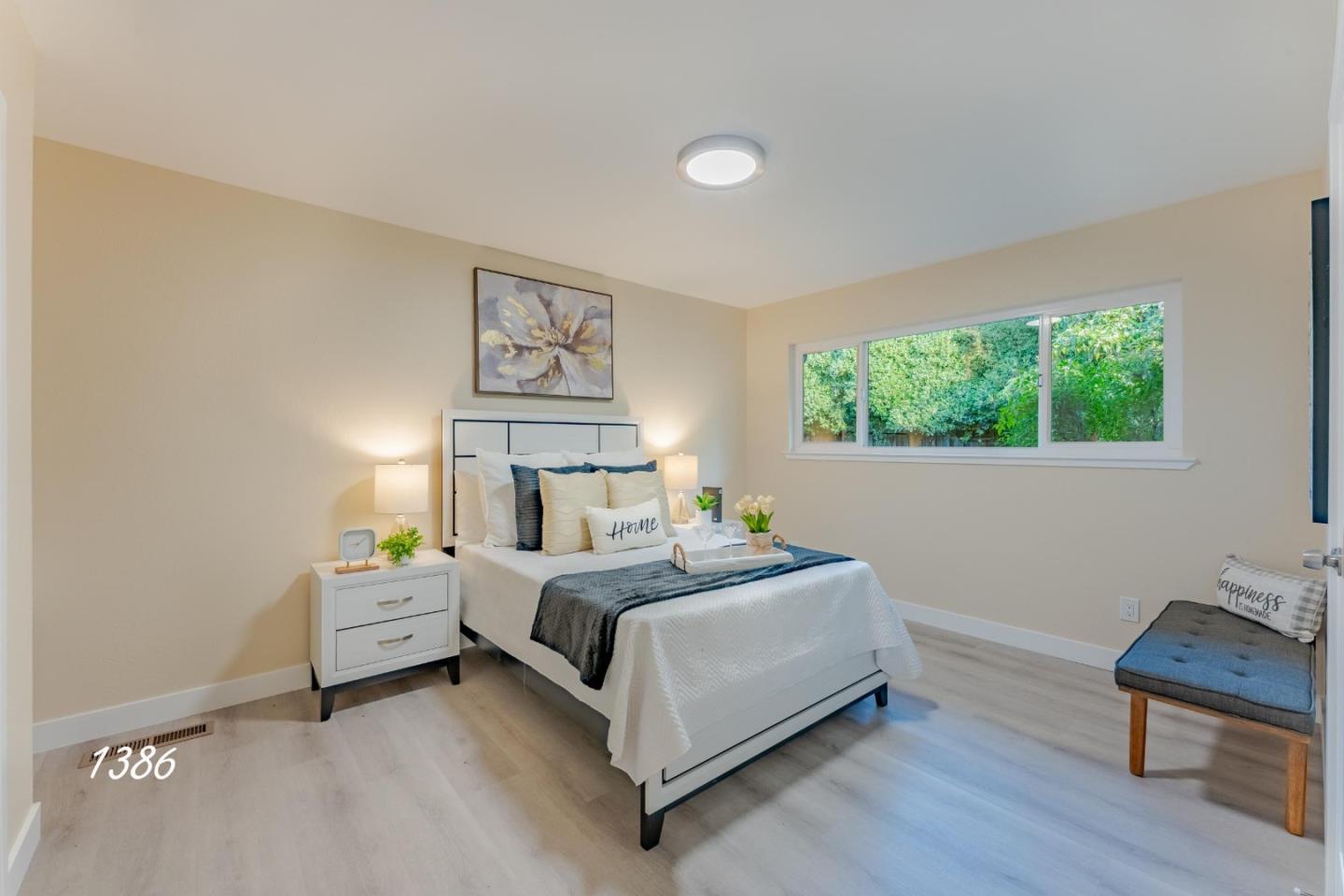 1384 Darryl Drive San Jose, CA 95130 - Photo 19 of 34 a bedroom with a bed and a chair