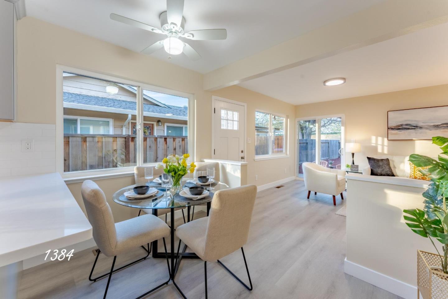 1384 Darryl Drive San Jose, CA 95130 - Photo 24 of 34 a dining room with furniture garden view and a chandelier