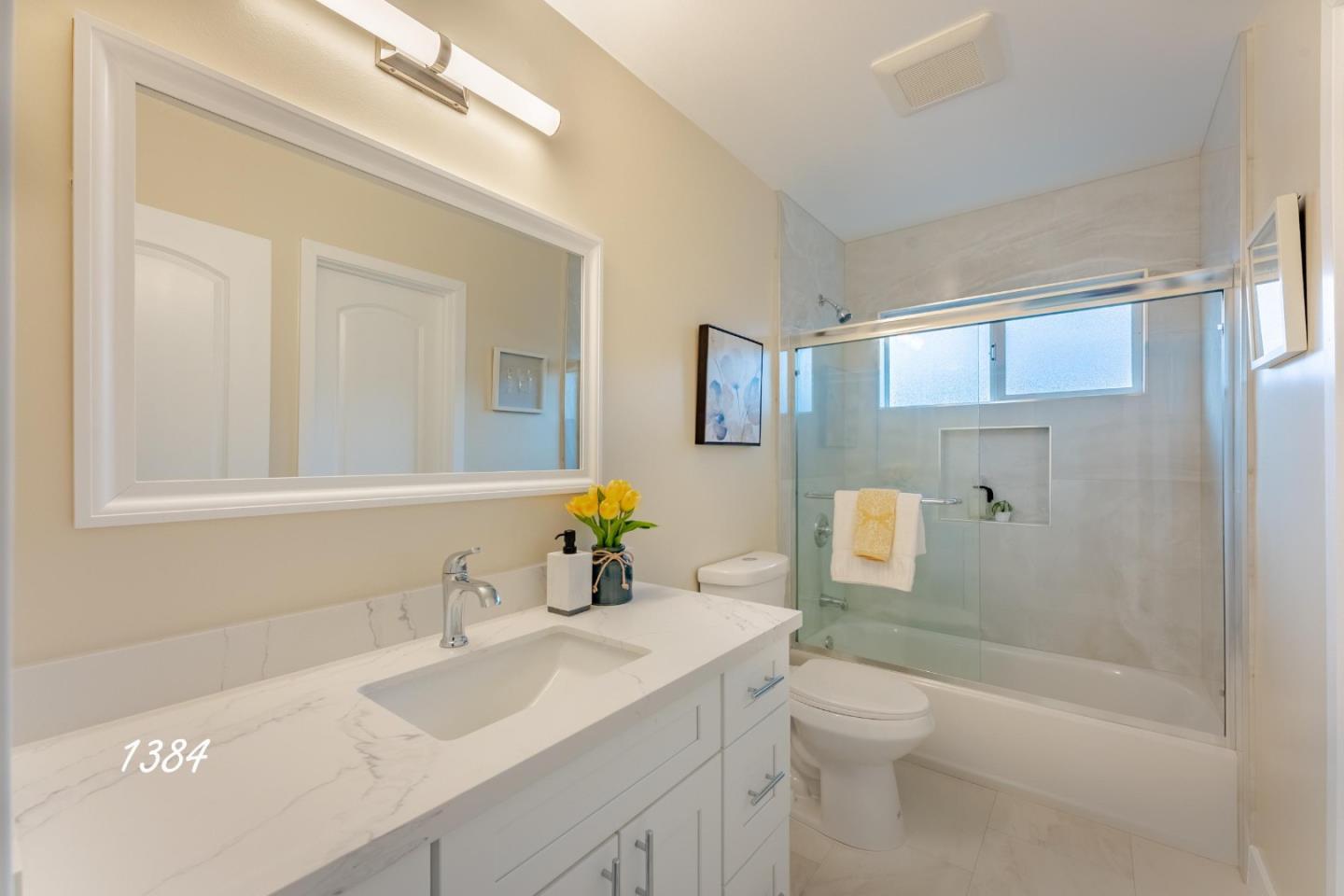 1384 Darryl Drive San Jose, CA 95130 - Photo 27 of 34 a bathroom with a sink a toilet and shower