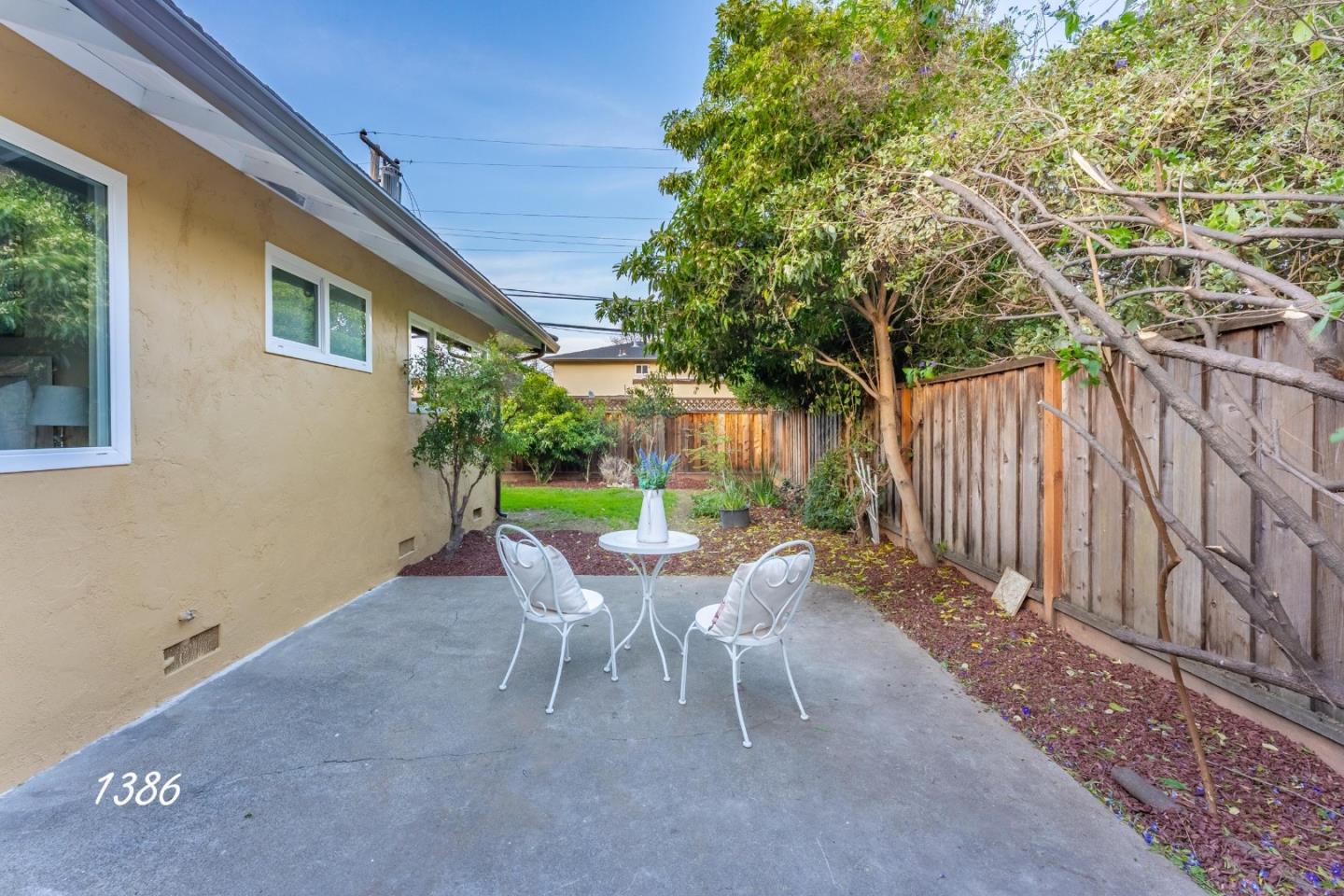 1384 Darryl Drive San Jose, CA 95130 - Photo 5 of 34 a view of a chair and table in backyard of the house