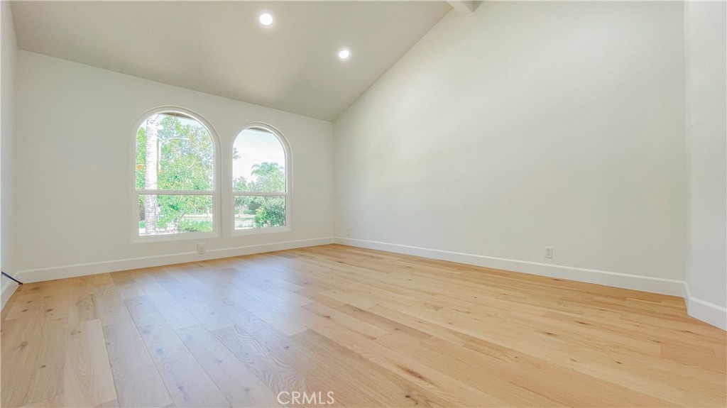 45 Westport Irvine, CA 92620 - Photo 29 of 45 an empty room with wooden floor and windows