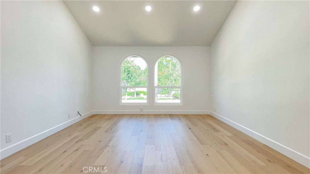 45 Westport Irvine, CA 92620 - Photo 30 of 45 an empty room with wooden floor and windows