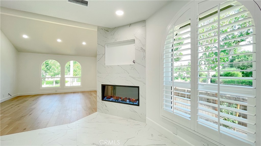 45 Westport Irvine, CA 92620 - Photo 33 of 45 an empty room with windows and fireplace