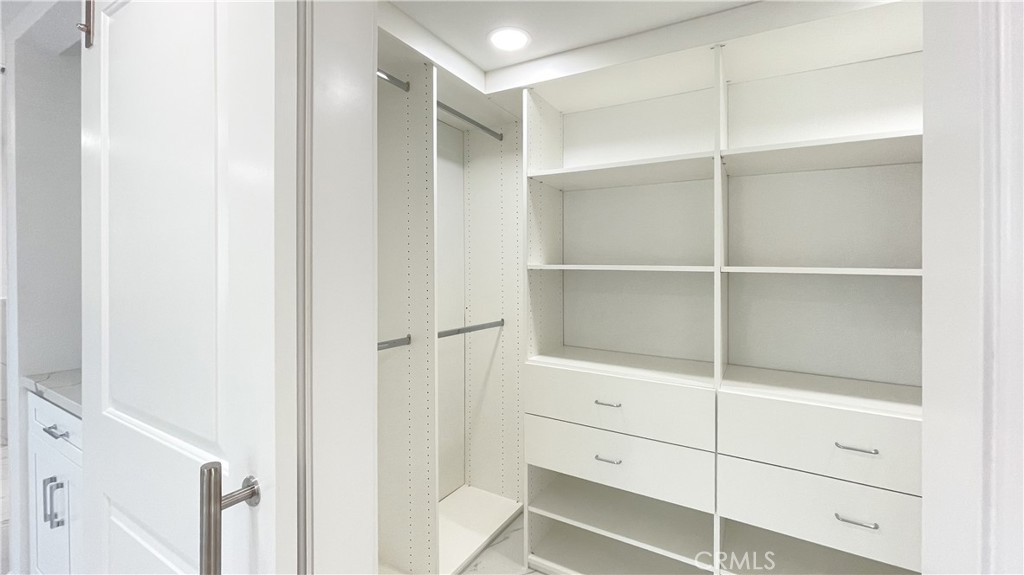 45 Westport Irvine, CA 92620 - Photo 40 of 45 a view of an empty walk in closet