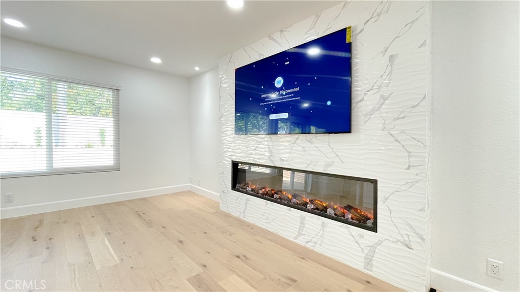 45 Westport Irvine, CA 92620 - Photo 8 of 45 a living room with stainless steel appliances granite countertop a stove and a window