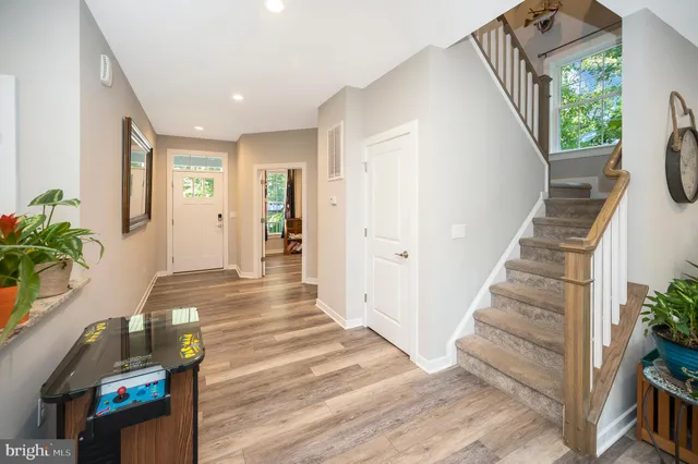 a view of a room that has a bed and a closet