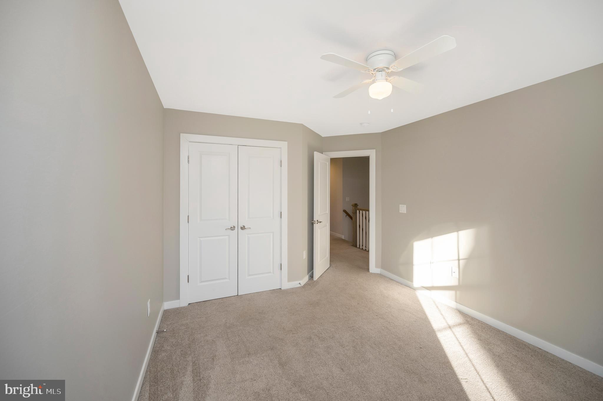 112 Butler Circle Locust Grove, VA 22508 - Photo 28 of 57 a view of a livingroom with a ceiling fan and window